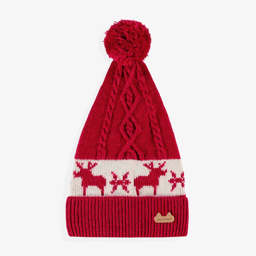Red knit beanie with reindeer pattern on a white background