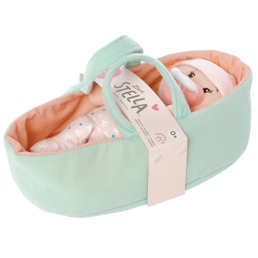 Mint green baby carrier with pink interior containing a baby doll, branded 'Love, Stella'.