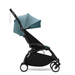 Black and aqua blue travel stroller on a white background