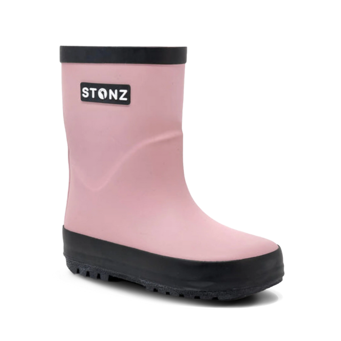 Pink rain boot with black sole and Stonz logo on a white background
