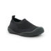 Black slip-on shoe on a white background