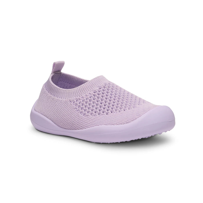 Purple slip-on shoe on a white background