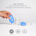 Hand holding a blue cap of a product with text about easy cleaning and safety features on a white background.