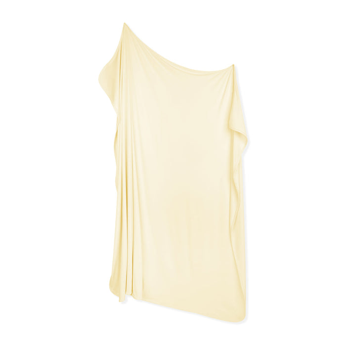 Light yellow blanket on a white background