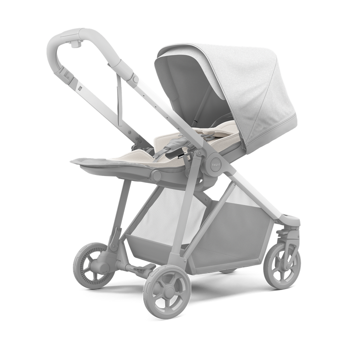 Silhouette of and white stroller with infant insert for newborn a white background