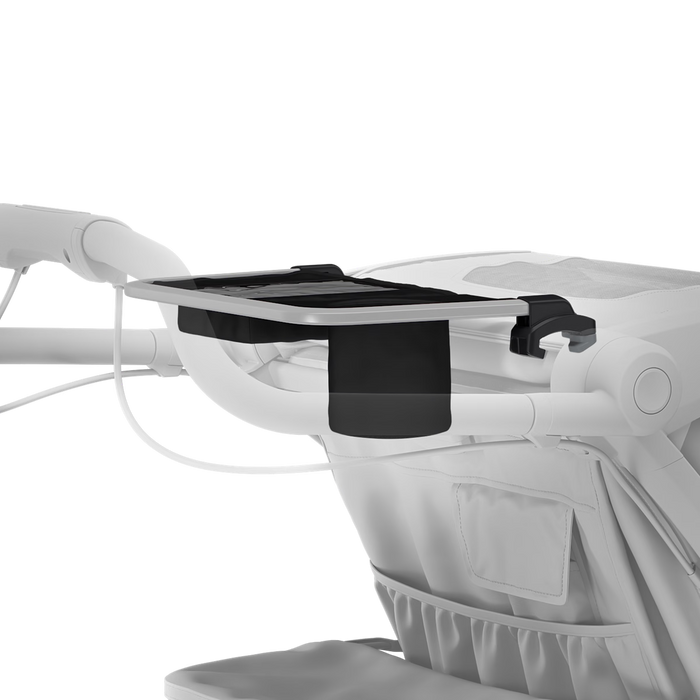 silhouette of thule organizer tray on back of a thule stroller
