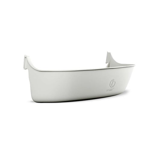 White storage accessory for Tripp Trapp High Chair with a logo on a white background