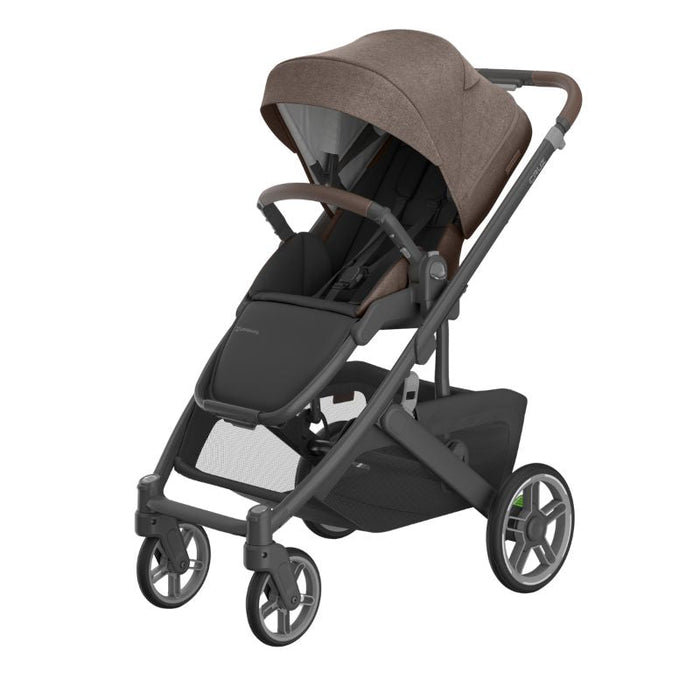 Brown and black uppababy stroller on a white background