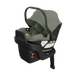 Green UPPAbaby infant car seat with black base on a white background