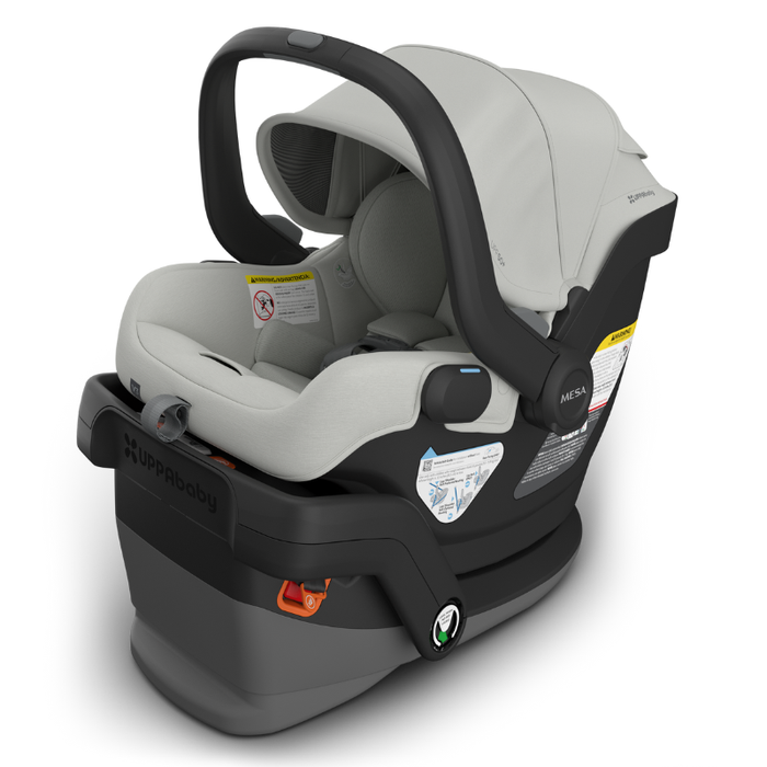 Light grey and black UPPAbaby infant car seat with visible branding on a white background