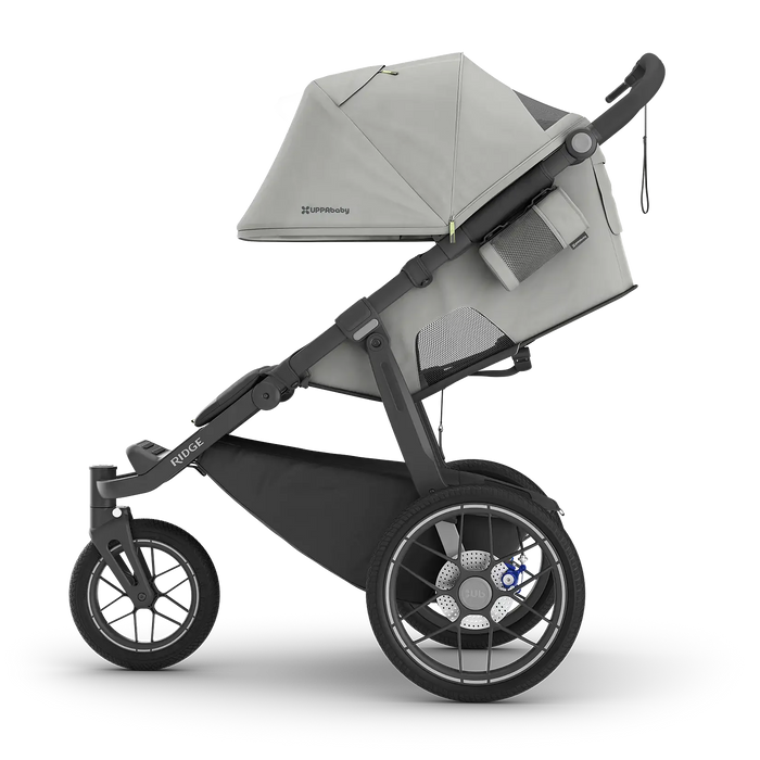 Gray and black stroller on a white background