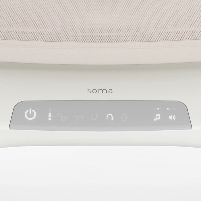 Control panel of a SOMA bassinet with various movement, speed and sound icons on a light background