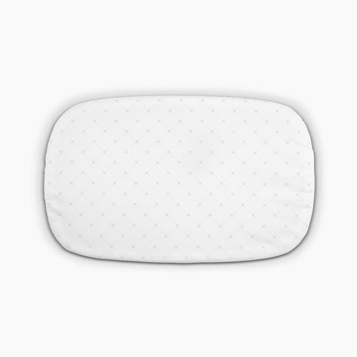 white mattress bassinet cover on a light background