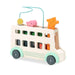 Colorful wooden toy bus with shape sorter and animal figures on a white background