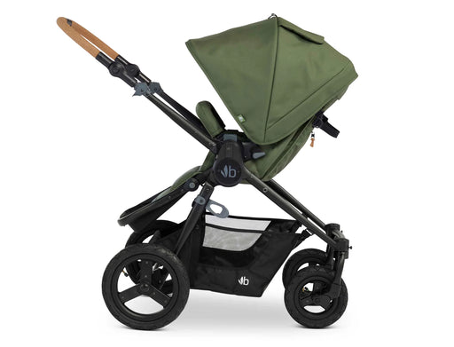 Bumbleride Era Stroller profile in Olive Green canopy showing large rear air-filled tires roomy storage basket and cork handlebar