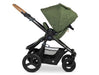 Bumbleride Era Stroller profile in Olive Green canopy showing large rear air-filled tires roomy storage basket and cork handlebar