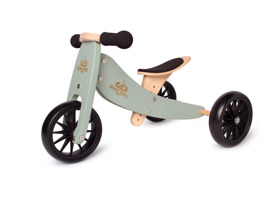 Kinderfeet Tiny Tot wooden bike shown with 3 wheels in sage green
