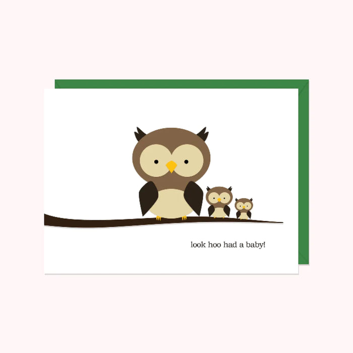 Three owls perch on a branch in 3 different sizes. Card reads "Look hoo had a baby" original design by Halifax Paper Hearts