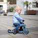 caption-Child sitting on Scoot and Ride HIghwaykick 1 as bike