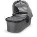 caption-Greyson Uppababy bassinet for stroller use in dark grey melange fabric on canopy and body of bassinet plus zippered overlay. Black metal framing to coordinate with stroller frame is exposed at upper part of bassinet