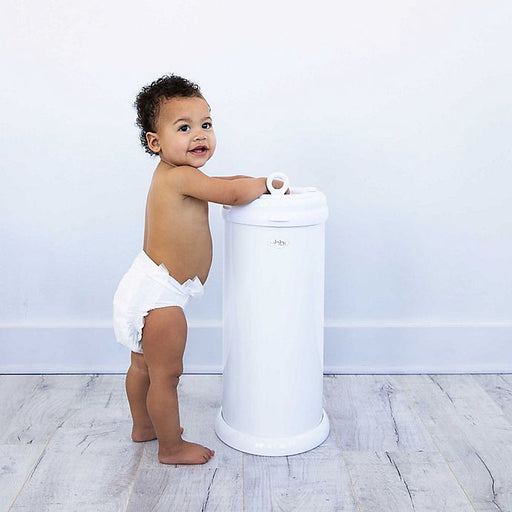 caption-Slim diaper pail accommodates cloth or disposable diapers
