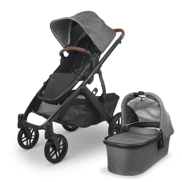 caption-Charcoal Melange Fabric with Chestnut Leather UPPAbaby Stroller and included Bassinet