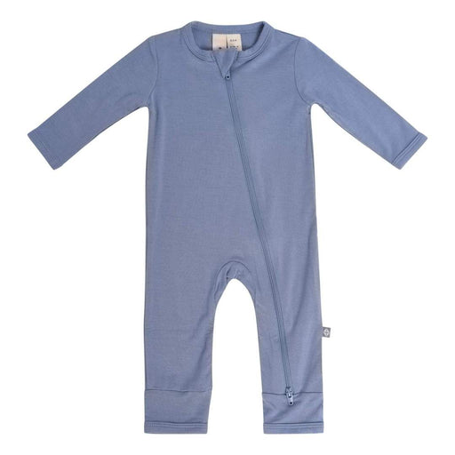A zippered blue Kyte Baby romper for infants