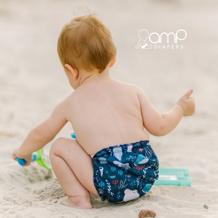 caption-Deep Sea Swim Diaper by AMP Diapers on baby at beach