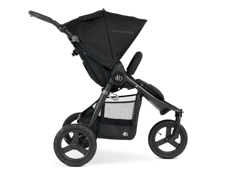 Side view of Bumbleride Indie Stroller with 3 large wheels, roomy basket. Seat is shown upright on the black frame.