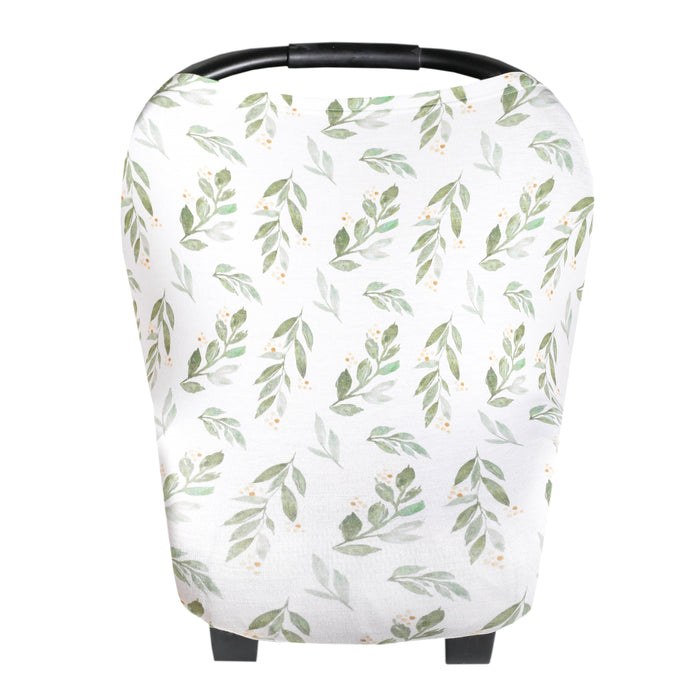 caption-Fern Multi Use Cover over a car seat