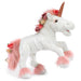 caption-Unicorn features floral mane and tail plus metallic rose gold spiralled horn